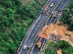 In this photo released by Xinhua News Agency, an aerial photo shows rescuers work at the site of a collapsed road section of the Meizhou-Dabu Expressway in Meizhou, south China's Guangdong Province, Wednesday, May 1, 2024. A section of a highway collapsed early Wednesday in southern China leaving more than a dozen of people dead, local officials said, after the area had experienced heavy rain in recent days. (Xinhua News Agency via AP)