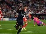 Real Madrid's Vinicius Junior celebrates after scoring his side's opening goal during the Champions League semifinal first leg soccer match between Bayern Munich and Real Madrid at the Allianz Arena in Munich Real Madrid's Vinicius Junior celebrates after scoring his side's opening goal during the Champions League semifinal first leg soccer match between Bayern Munich and Real Madrid at the Allianz Arena in Munich