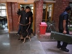 After receiving a threat, a police team searches Delhi Public School in Noida Sector 30 on Wednesday. (Sunil Ghosh/HT)