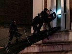 Using a tactical vehicle, New York City police enter an upper floor of Hamilton Hall on the Columbia University campus in New York Tuesday, April 30, 2024, after a building was taken over by protesters earlier Tuesday.&nbsp;
