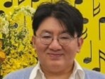 HYBE chairperson Bang Si-Hyuk and ADOR CEO Min Hee-jin. 