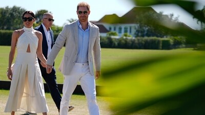 Britain's Prince Harry and wife Meghan Markle, Duchess of Sussex, arrive for the 2024 Royal Salute Polo Challenge to Benefit Sentebale, Friday, April 12, 2024, in Wellington, Fla. Prince Harry, co-founding patron of the Sentebale charity, will play on the Royal Salute Sentebale Team. (AP Photo/Rebecca Blackwell) (AP) Britain's Prince Harry and wife Meghan Markle, Duchess of Sussex, arrive for the 2024 Royal Salute Polo Challenge to Benefit Sentebale, Friday, April 12, 2024, in Wellington, Fla. Prince Harry, co-founding patron of the Sentebale charity, will play on the Royal Salute Sentebale Team. (AP Photo/Rebecca Blackwell) (AP)