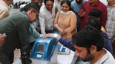 An electoral officer demonstrates the functioning of the EVMs and VVPATs to polling officials during a training programme for Lok Sabha elections in Gurugram. (ANI FILE) An electoral officer demonstrates the functioning of the EVMs and VVPATs to polling officials during a training programme for Lok Sabha elections in Gurugram. (ANI FILE)