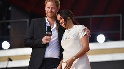 (FILES) Britain's Prince Harry and Meghan Markle speak during the 2021 Global Citizen Live festival at the Great Lawn, Central Park on September 25, 2021 in New York City. (AFP) (FILES) Britain's Prince Harry and Meghan Markle speak during the 2021 Global Citizen Live festival at the Great Lawn, Central Park on September 25, 2021 in New York City. (AFP)