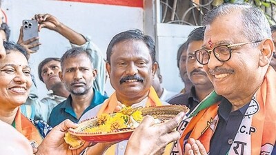 Former special public prosecutor and Mumbai North Central candidate Ujjwal Nikam visited Sahar village for campaigning on Tuesday. (Satish Bate/ Hindustan Times)