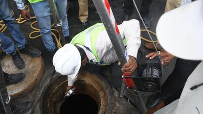 Rescue personnel at the site of the sewer line mishap in Lucknow on Wednesday. (Deepak Gupta/Hindustan Times) Rescue personnel at the site of the sewer line mishap in Lucknow on Wednesday. (Deepak Gupta/Hindustan Times)