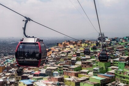 Ciudad Bolivar's transformation into a tourist destination with the introduction of the TransMiCable cable car has attracted about 400 tourists a month. (AFP) Ciudad Bolivar's transformation into a tourist destination with the introduction of the TransMiCable cable car has attracted about 400 tourists a month. (AFP)