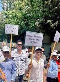 Shaan with placards to encourage people to vote (Instagram/singer_shaan) Shaan with placards to encourage people to vote (Instagram/singer_shaan)