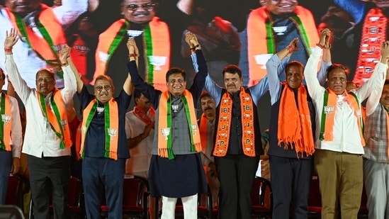 Mumbai, India. May 01, 2024: Maharashtra Deputy Chief Minister Devendra Fadnavis along with Mahayuti Candidate from Mumbai Piyush Goyal and Ujjwal Nikamattended a party workers rally (Karykarta Melava) organized by Mumbai Bharatiya Janata party (BJP) at Kamgar ground, Dadar in Mumbai. May 01, 2024. (Photo by Raju Shinde/HT Photo)