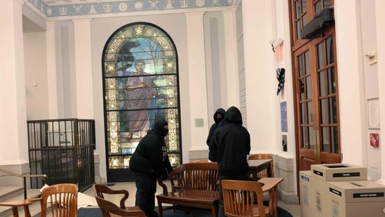 NEW YORK, NEW YORK - APRIL 30: Demonstrators from the pro-Palestine encampment barricade themselves inside Hamilton Hall, an academic building at Colombia University, on April 30, 2024 in New York City. Pro-Palestinian demonstrators marched around the "Gaza Solidarity Encampment" at Columbia University as a 2 P.M. deadline to clear the encampment given to students by the university passed.&nbsp;(Getty Images via AFP)