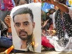 Bengaluru: NSUI members burn a poster of JD(S) MP Prajwal Revanna during a protest against his involvement in the alleged sexual abuse case, on April 30 (PTI)