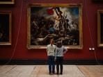 Restorers have uncovered the vibrant colours of Delacroix's "Liberty Leading the People" at the Louvre.