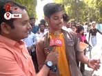 Aaj Tak reporter in conversation with a student at the protest. Aaj Tak reporter in conversation with a student at the protest.