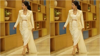 Her stunning outfit is from the shelves of the brand Urmil by Ritika & Prerna and comes in an enchanting light yellow shade and features a sweetheart neckline blouse, matching skirt with wrap pattern, a side slit, and extended fabric weeping the floor. (Instagram/@realhinakhan) Her stunning outfit is from the shelves of the brand Urmil by Ritika & Prerna and comes in an enchanting light yellow shade and features a sweetheart neckline blouse, matching skirt with wrap pattern, a side slit, and extended fabric weeping the floor. (Instagram/@realhinakhan)