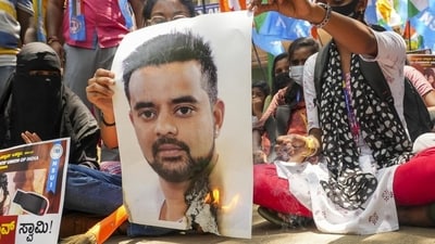 Bengaluru: NSUI members burn a poster of JD(S) MP Prajwal Revanna during a protest against his involvement in the alleged sexual abuse case, on April 30 (PTI) Bengaluru: NSUI members burn a poster of JD(S) MP Prajwal Revanna during a protest against his involvement in the alleged sexual abuse case, on April 30 (PTI)