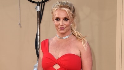 FILE - Britney Spears arrives at the Los Angeles premiere of "Once Upon a Time in Hollywood," on July 22, 2019. Spear’s highly anticipated memoir “The Woman in Me” will be released Tuesday, Oct. 24, 2023. (Jordan Strauss/Invision/AP)
