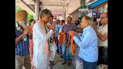 Congress candidate Manish Tewari during door-to-door campaigning in Chandigarh on Thursday. (HT photo) Congress candidate Manish Tewari during door-to-door campaigning in Chandigarh on Thursday. (HT photo)