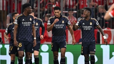 Real Madrid's Brazilian forward #07 Vinicius Junior (R) celebrates scoring with teammates during the UEFA Champions League semi-final first leg football match vs FC Bayern Munich (AFP) Real Madrid's Brazilian forward #07 Vinicius Junior (R) celebrates scoring with teammates during the UEFA Champions League semi-final first leg football match vs FC Bayern Munich (AFP)