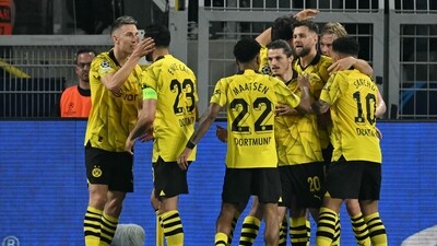 Dortmund's German forward #14 Niclas Fullkrug (2nd R) celebrates scoring the opening goal during UEFA Champions League semi-final first leg football match between Borussia Dortmund and Paris Saint-Germain (AFP)