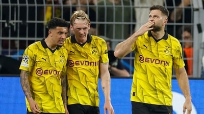 Dortmund's German forward #14 Niclas Fuellkrug (R) celebrates with midfielder #10 Jadon Sancho (L) and #19 Julian Brandt (AFP) Dortmund's German forward #14 Niclas Fuellkrug (R) celebrates with midfielder #10 Jadon Sancho (L) and #19 Julian Brandt (AFP)