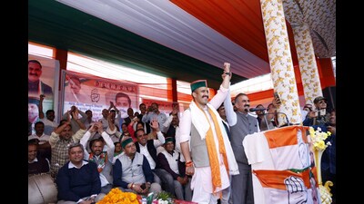 Himachal Pradesh chief minister along with congress candidate from Mandi Vikramaditya Singh during election campaign in Karsog Mandi district on Thursday. (Birbal Sharma/HT)