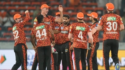 Sunrisers Hyderabad's Bhuvneshwar Kumar, centre, celebrates with teammates (AP)
