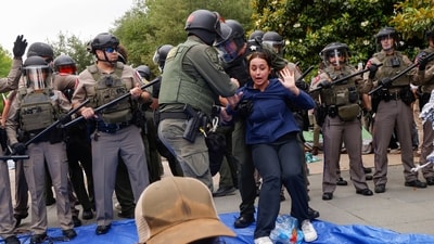 Protesters are taken into custody as law enforcement dismantle an encampment by pro-Palestinian students at the University of Texas at Dallas' Chess Plaza on Wednesday, May 1, 2024, in Richardson. More than a dozen protesters were arrested. (Juan Figueroa/The Dallas Morning News via AP) (AP) Protesters are taken into custody as law enforcement dismantle an encampment by pro-Palestinian students at the University of Texas at Dallas' Chess Plaza on Wednesday, May 1, 2024, in Richardson. More than a dozen protesters were arrested. (Juan Figueroa/The Dallas Morning News via AP) (AP)
