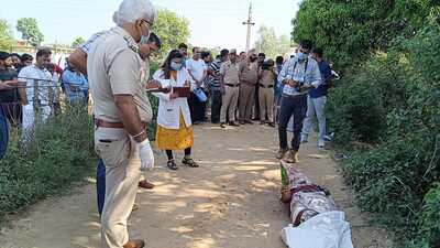 The victim’s throat was slit, and the head and face also bore injuries inflicted by sharp-edged weapons, while his legs were bound with a leather belt. (HT photo) The victim’s throat was slit, and the head and face also bore injuries inflicted by sharp-edged weapons, while his legs were bound with a leather belt. (HT photo)