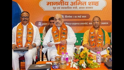 Union Home Minister Amit Shah and Chief Minister Yogi Adityanath at a BJP meeting in Lucknow on Thursday (PTI) Union Home Minister Amit Shah and Chief Minister Yogi Adityanath at a BJP meeting in Lucknow on Thursday (PTI)