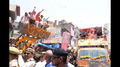 Uttar Pradesh CM Yogi Adityanath during his roadshow in Mainpuri on May 2. (HT photo) Uttar Pradesh CM Yogi Adityanath during his roadshow in Mainpuri on May 2. (HT photo)