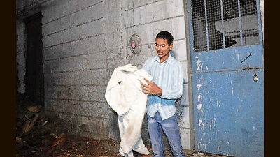 Victim Jagdish Sharma’s son outside the rubber factory in Jaspal Bangar area; and (inset) victim Jagdish Sharma. (HT Photo) Victim Jagdish Sharma’s son outside the rubber factory in Jaspal Bangar area; and (inset) victim Jagdish Sharma. (HT Photo)