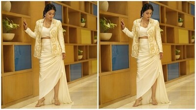 Assisted by celebrity fashion stylist Saachi Vijaywargia, Hina accessorised her look with a pair of statement pearl earrings and stylish silver studded transparent high heels, which complemented her look perfectly. (Instagram/@realhinakhan) Assisted by celebrity fashion stylist Saachi Vijaywargia, Hina accessorised her look with a pair of statement pearl earrings and stylish silver studded transparent high heels, which complemented her look perfectly. (Instagram/@realhinakhan)