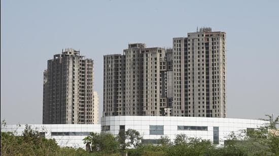 The Noida authority had earlier informed the court that it cannot approve the revised building maps because Unitech has not paid land cost dues of ₹11,000 crore. (Sunil Ghosh/HT Photo)