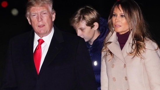 US president Donald Trump, First Lady Melania Trump and son Barron at the White House in Washington, DC on January 1, 2018. (AFP Photo)