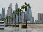 Vehicles drive along a flooded street in Dubai as heavy rains returned to the United Arab Emirates just two weeks after record downpours that experts linked to climate change. Vehicles drive along a flooded street in Dubai as heavy rains returned to the United Arab Emirates just two weeks after record downpours that experts linked to climate change.