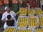 File: A vendor sells alphonso variety of mangoes, from Konkan region, at Crawford Market in Mumbai, Maharashtra. (Bhushan Koyande / HT Photo)