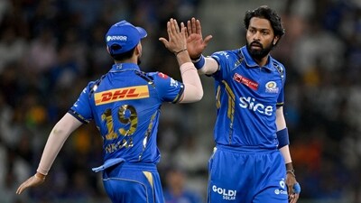 Mumbai Indians' captain Hardik Pandya (R) celebrates with teammate (AFP) Mumbai Indians' captain Hardik Pandya (R) celebrates with teammate (AFP)
