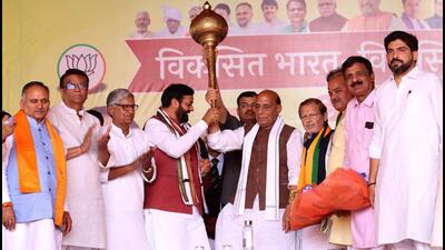 Defence minister Rajnath Singh with Haryana CM Nayab Saini and BJP’s Rohtak candidate Arvind Sharma in Rohtak on Friday. (MANOJ DHAKA/HT) Defence minister Rajnath Singh with Haryana CM Nayab Saini and BJP’s Rohtak candidate Arvind Sharma in Rohtak on Friday. (MANOJ DHAKA/HT)