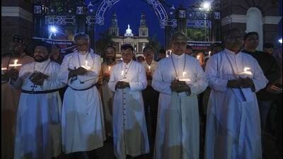 Ecumenical Commission of Archdiocese of Delhi during a light candle vigil for Manipur, at Sacred Heart cathedral, in New Delhi, on Friday. (PTI) Ecumenical Commission of Archdiocese of Delhi during a light candle vigil for Manipur, at Sacred Heart cathedral, in New Delhi, on Friday. (PTI)