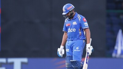 Mumbai Indians' Rohit Sharma reacts as he walks back to pavilion after being dismissed by Delhi Capitals' Khaleel Ahmed (AP)