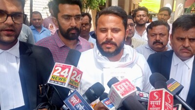 Karnal Congress candidate Divyanshu Budhiraja interacting with the media after he was let off on bail in Panchkula on Friday. (Sant Arora/HT)