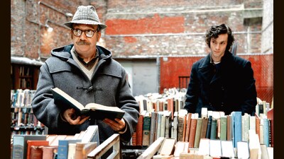 Paul Giamatti is Paul Hunham, in The Holdovers (2023); seen here with student Angus Tully (played by Dominic Sessa). Paul Giamatti is Paul Hunham, in The Holdovers (2023); seen here with student Angus Tully (played by Dominic Sessa).