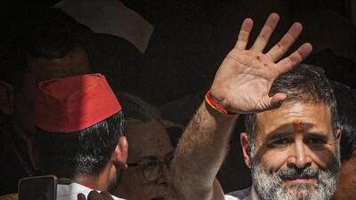 Rahul Gandhi waves to supporters in Rae Bareli. (PTI PHOTO) Rahul Gandhi waves to supporters in Rae Bareli. (PTI PHOTO)