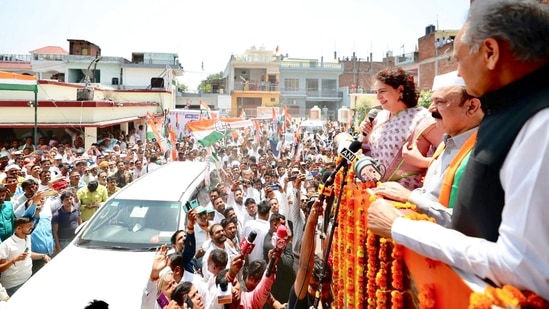 Congress leader Priyanka Gandhi Vadra speaks to supporters at a roadshow before the nomination filing of the party candidate, Kishori Lal Sharma from Amethi constituency, in Uttar Pradesh.(PTI)