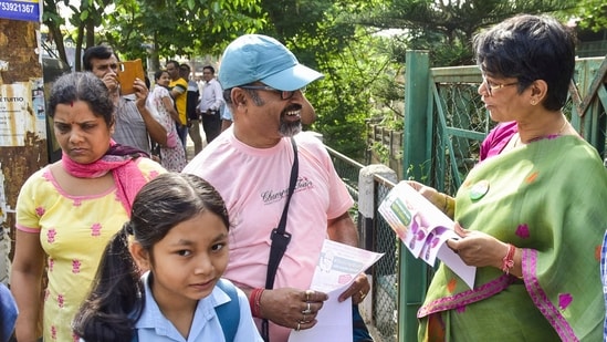 Assam Pradesh Mahila Congress President and the party candidate from Guwahati constituency, Mira Borthakur Goswami during her election campaign outside Assam Jatiya Bidyalay, in Guwahati, Assam.(PTI)