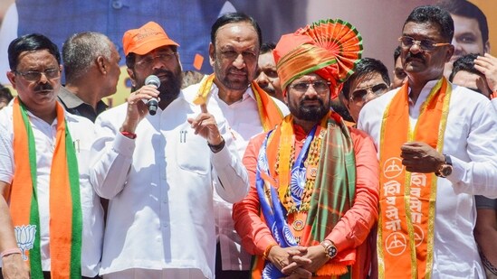 Maharashtra Chief Minister Eknath Shinde addresses supporters during a nomination rally of Shiv Sena (Shinde faction) candidate from Thane constituency, Naresh Mhaske, in Thane, Maharashtra.(PTI)
