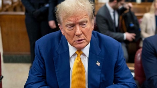 Former US President Donald Trump attends his trial for allegedly covering up hush money payments linked to extramarital affairs, at Manhattan Criminal Court in New York City, on May 2, 2024. Trump, 77, is accused of falsifying business records to reimburse his lawyer, Michael Cohen, for a $130,000 hush money payment made to porn star Stormy Daniels just days ahead of the 2016 election against Hillary Clinton. (Photo by Doug Mills / POOL / AFP) (AFP)