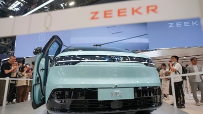 Visitors look at a Zeekr Mix car during the China Auto Show in Beijing, China, Friday, April 26, 2024. (AP Photo/Tatan Syuflana) Visitors look at a Zeekr Mix car during the China Auto Show in Beijing, China, Friday, April 26, 2024. (AP Photo/Tatan Syuflana)