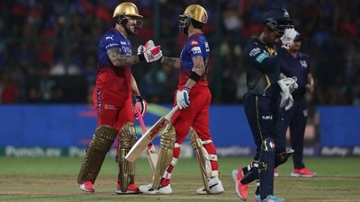 Faf du Plessis (64, 23b, 10x4, 3x6) and Virat Kohli (42, 27b, 2x4, 4x6) made sure Royal Challengers Bengaluru registered a four-wicket win over Gujarat Titans. RCB also moved up on the points table and are currently placed at the seventh spot. (AP) Faf du Plessis (64, 23b, 10x4, 3x6) and Virat Kohli (42, 27b, 2x4, 4x6) made sure Royal Challengers Bengaluru registered a four-wicket win over Gujarat Titans. RCB also moved up on the points table and are currently placed at the seventh spot. (AP)