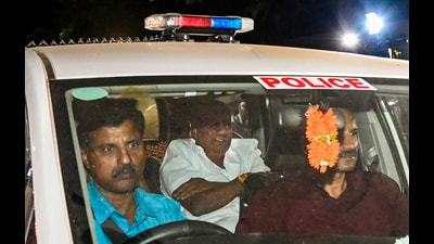 JD(S) MLA HD Revanna being taken into custody by officials of a Special Investigation Team, on Saturday. (PTI) JD(S) MLA HD Revanna being taken into custody by officials of a Special Investigation Team, on Saturday. (PTI)